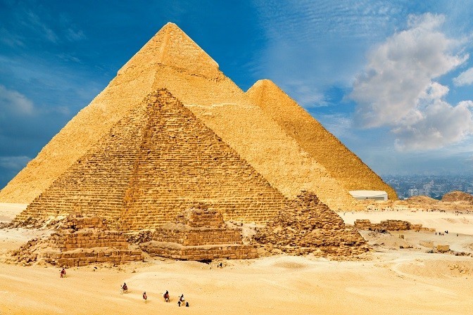 This ancient wonder in Egypt is one of the Seven Wonders of the World and is famous for its massive pyramids and mysterious Sphinx. What is it called?