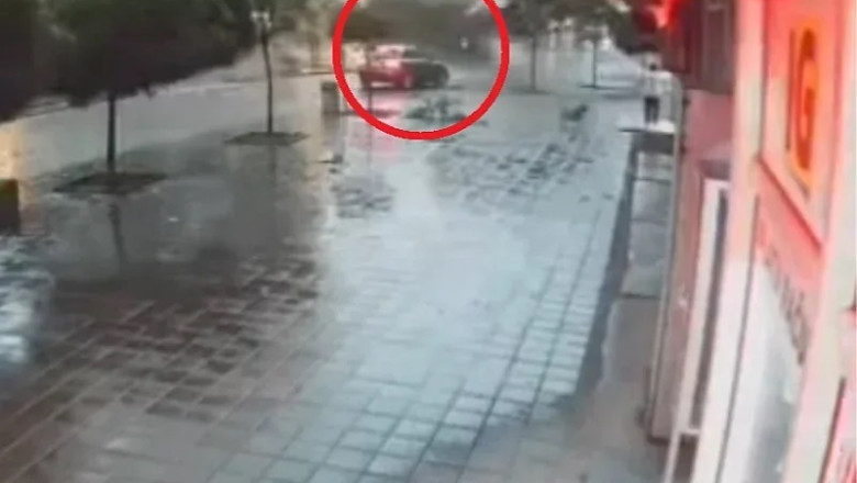 Incredible footage from Serbia: Driver slams on brakes before building roof falls onto sidewalk in front of him